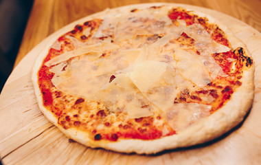 Close-Up Pepperoni Pizza bacon barbeque pizza cheese, salami, Tomatoes, pepper, Spices and Fresh Basil. Italian pizza at restaurant  Eating and leisure concept.lifestyle Organic Gourmet Concept banner