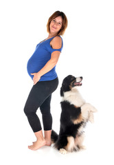 Naklejka na ściany i meble pregnant woman and dog