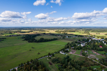 Obraz premium Overhead view of foliage trees, fields and roads in Western Europe. Aerial photography.