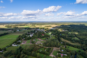 Overhead view of foliage trees, fields and roads in Western Europe. Aerial photography.