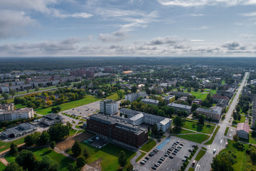 Aerial view of the city at summer morning. Beautiful summer city landscape. 