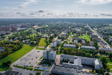 Aerial view of the city at summer morning. Beautiful summer city landscape. 