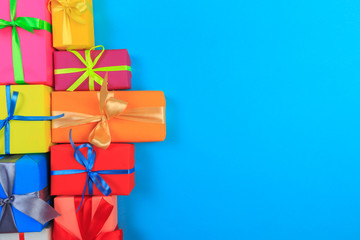 Different colored gift box on color background. Top view of various present boxes on minimal background. Birthday, Christmas, wedding, valentine, romantic gifts - Image