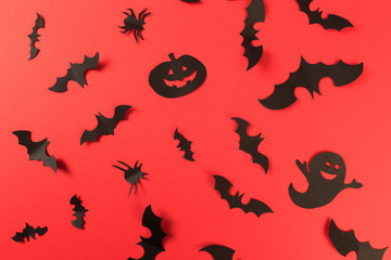 Halloween paper decorations on red background. Halloween concept. Flat lay, top view, copy space - Image
