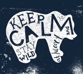 Wandaufkleber Hand drawn label with textured bear silhouette and lettering . Keep calm and stay wild at heart © Marina Gorskaya
