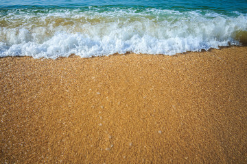 beautiful sandy beach and soft blue ocean wave