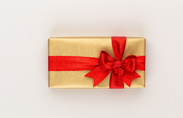 Christmas gift boxes with ribbons on color tabletop.