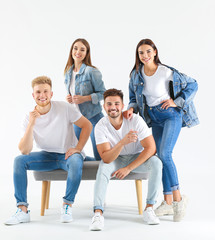Obraz premium Group of young people in stylish casual clothes on white background