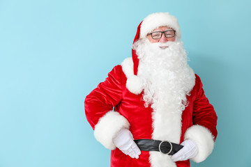 Happy Santa Claus on color background