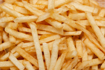thin straw fried potatoes on a white background