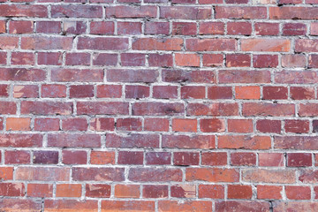 Old brick wall in a background image.