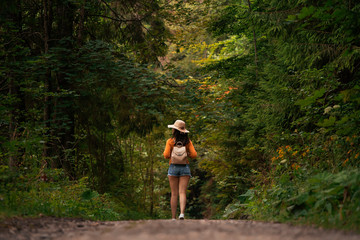 Unrecognizable woman on the woods