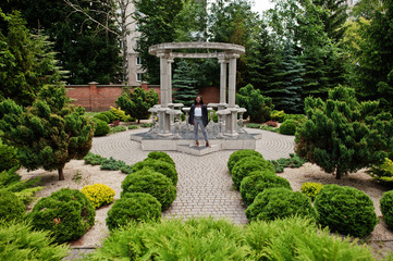 African american woman outdoor with rosary on hand. Concept for Faith, Spirituality and Religion.