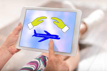 Travel insurance concept on a tablet