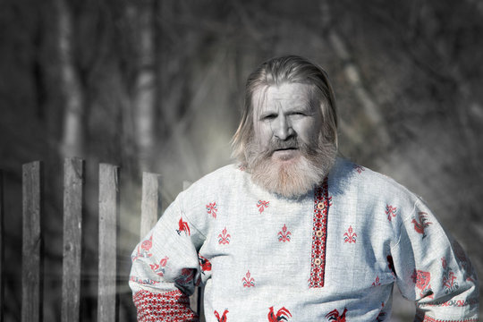 Slavic man in a beautiful national painted shirt