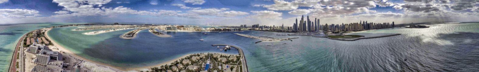 Fototapeta premium Dubai Palm Jumeirah. Aerial view of Dubai at dusk, UAE