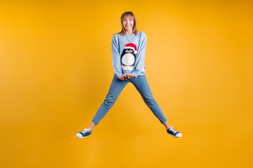 Fototapeta na wymiar Full length size body photo of pretty optimistic charming nice glad hipster student person holding hand together jumping in retro pullover isolated bright color background