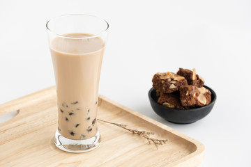 Taiwan milk tea with bubbles, ฺHomemade Milk Bubble Tea  whit dessert and table decoration, Popular Asian drink