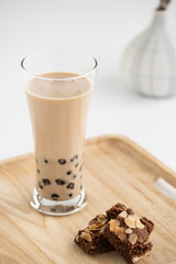 Taiwan milk tea with bubbles, ฺHomemade Milk Bubble Tea  whit dessert and table decoration, Popular Asian drink