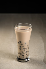 Taiwan milk tea with bubbles, ฺHomemade Milk Bubble Tea  whit dessert and table decoration, Popular Asian drink