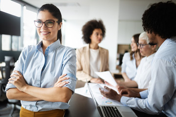 Business colleagues having meeting in conference room in office