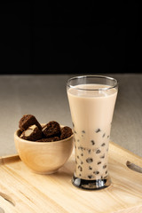 Taiwan milk tea with bubbles, ฺHomemade Milk Bubble Tea  whit dessert and table decoration, Popular Asian drink