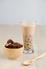 Taiwan milk tea with bubbles, ฺHomemade Milk Bubble Tea  whit dessert and table decoration, Popular Asian drink