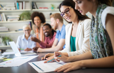 Creative business people working on business project