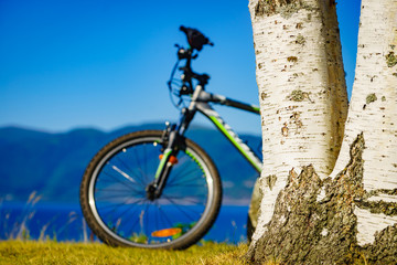 Bike on nature fjord shore, Norway