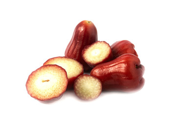 Fresh red rose apple Cut half isolate on white