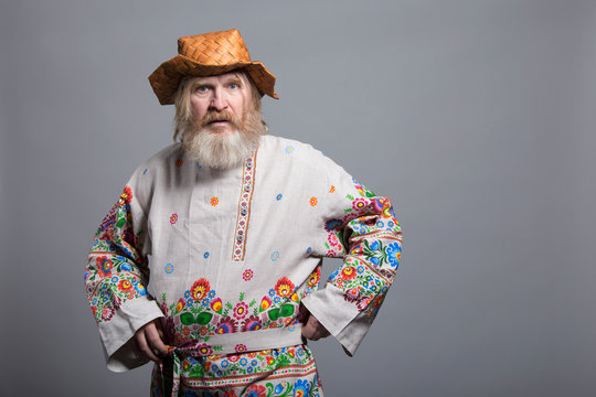 Slavic bearded painted shirt and birchbark hat