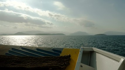 View from bow of cruise ship. Sailboat sailing in Mediterranean sea. Greece. 4K