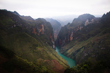 Heavy fog and karst mountains of Ha giang province in Vietnam that is famously known as the Ha giang loop by travelers