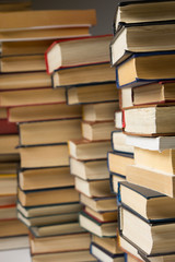 Stack of books background. many books piles.