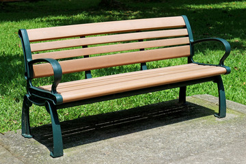 Outdoor Wooden Bench in the City Park