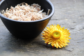 Vietnamese pulled pork in a bowl ready to be added to a Banh mi