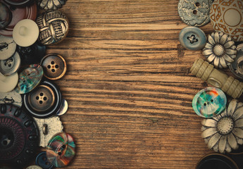 set of vintage buttons on aged boards