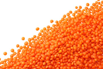 red lentils isolated on white background. Top view.