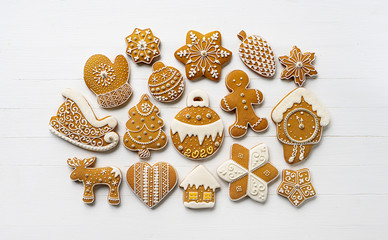 Homemade christmas cookies on white wooden table