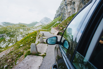 A trip to the mountains. The view from the car window. Tracking in Slovenia, Julian Alps.