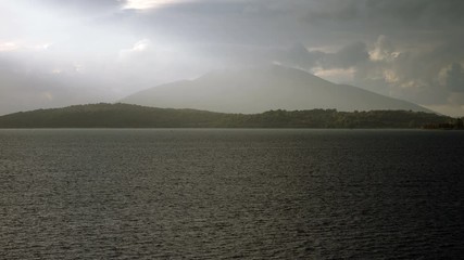 Rocky headland of Corfu. Landscape of the Ionian sea in Greece at dusk. 4K