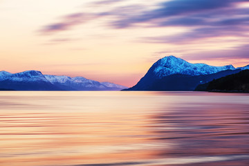 Sunset view of mountains in Molde, Norway in the evening at sunset
