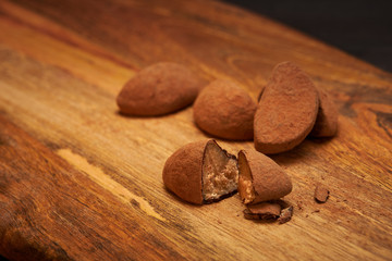 Marzipan candies in cocoa dusting