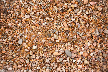 Little stones. Stones top view. Photo background with stones, texture. Background with copy space