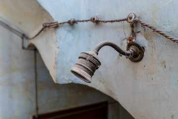 Old lamp holder of an old house
