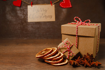 Christmas and New Year decoration. Gift box with red and white ribbon. 