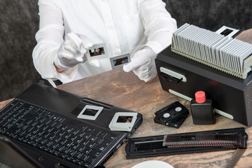 hand photographer digitize film slide for saving