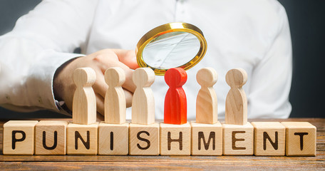 Red man in the spotlight and the word Punishment. The search for the perpetrators in order to...
