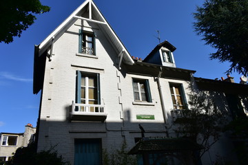 Famous Villa Leandre Street at Montmartre Neighbourhood. English house. Paris, France.