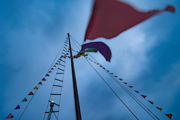Mast of a Boat with flags
